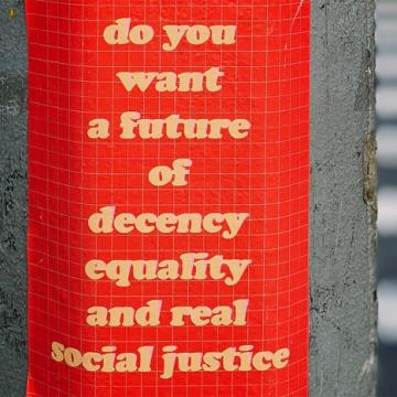 Sign saying do you want a future of decency equality and real social justice