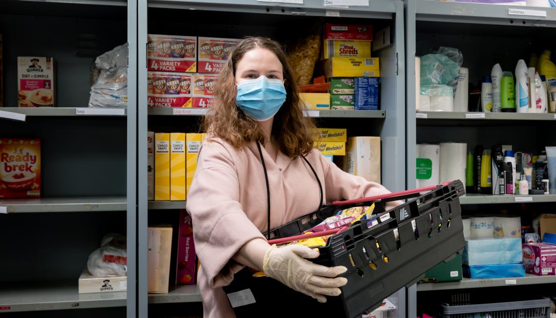 Woman helping in a food bank